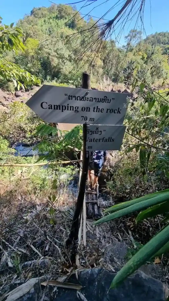 broken signs hiking trail bolaven plateau