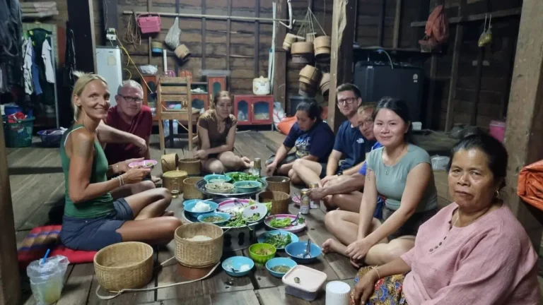 savannakhet homestay local lao-phu-thai family having dinner