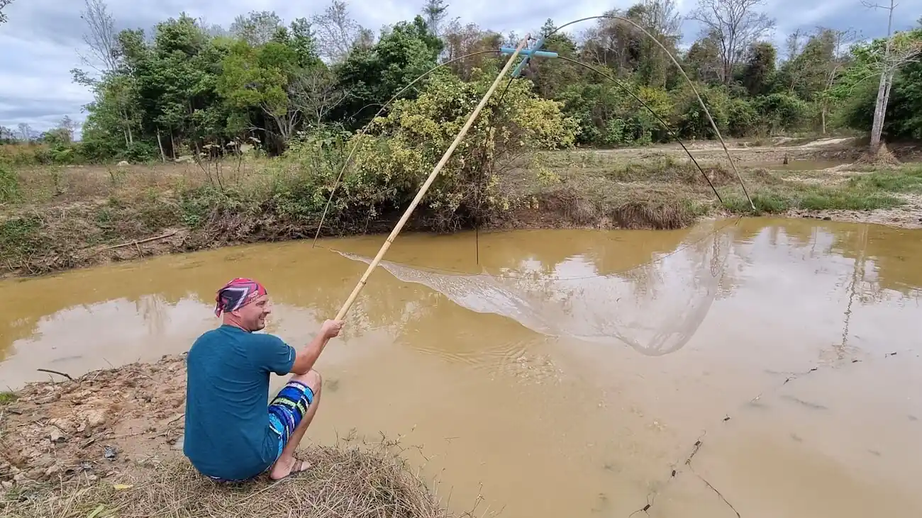 fishing with net in rural laos savannakhet province