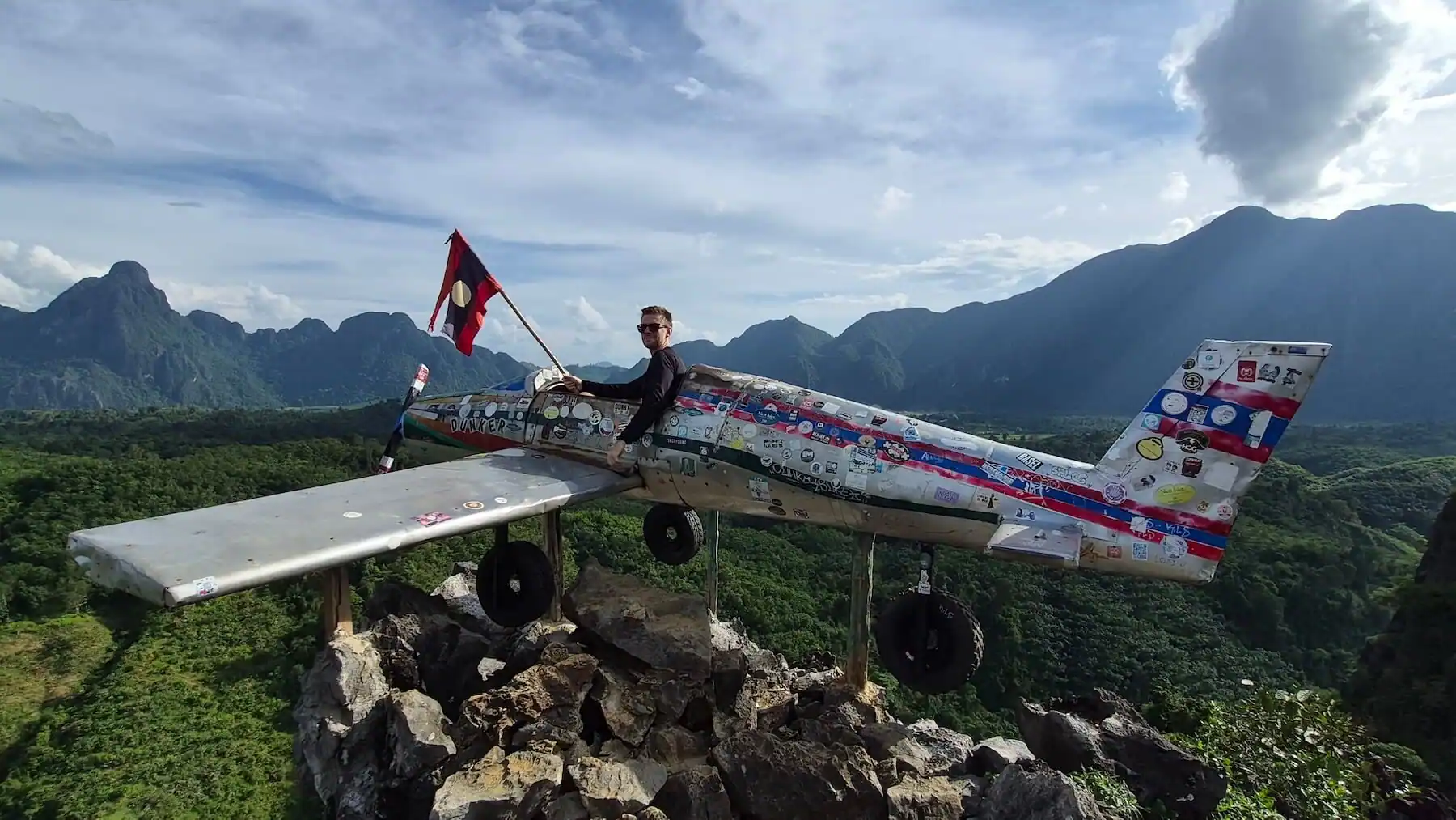 pha honekham viewpoint vang vieng with airplane on top